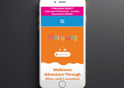 Black smartphone on dark background mockup to showcasing mobile website design PSD template () ()
