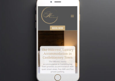Black smartphone on dark background mockup to showcasing mobile website design The Hillcrest Self Catering ()
